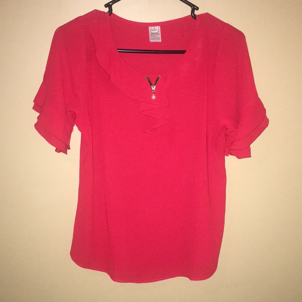 A red short sleeve shirt